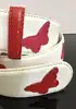 ceinture yves saint laurent en cuir blanc et papillons taille 85/34 référence 8966