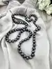 collier de perles synthétique avec un fermoir en argent l70cm argent 925 millième (22 ct) 59,48g