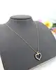 collier maille fantaisie limée orné d'un pendentif coeur serti de petits oxydes or 750 millième (18 ct) 2,09g