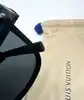 lunettes de soleil louis vuitton waimea noir monogram z1082w avec détails cloutés en métal argenté