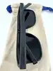 lunettes de soleil louis vuitton waimea noir monogram z1082w avec détails cloutés en métal argenté