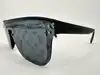 lunettes de soleil louis vuitton waimea noir monogram z1082w avec détails cloutés en métal argenté