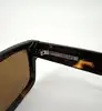lunettes de soleil prada spr 25z 2au-0b0 monture écaille et verres marron