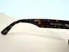 lunettes de soleil prada spr 25z 2au-0b0 monture écaille et verres marron