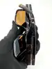 lunettes de soleil prada spr 25z 2au-0b0 monture écaille et verres marron