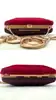 minaudière/pochette rigide marc by marc jacobs bordeaux avec chaîne dorée