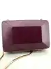 minaudière/pochette rigide marc by marc jacobs bordeaux avec chaîne dorée