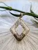 pendentif motifs ajourés serti de pierres marrons or 750 millième (18 ct) 3,91g