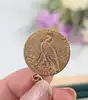 pendentif orné d'une pièce 5 dollars or or 750 millième (18 ct) 8,56g