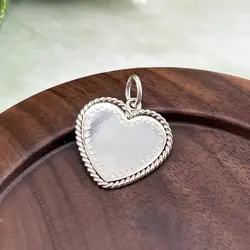 pendentif tiffany & co en forme de coeur  argent 925 millième (22 ct) 3,50g