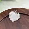 pendentif tiffany & co en forme de coeur  argent 925 millième (22 ct) 3,50g