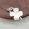 pendentif tiffany & co en forme de trèfle  argent 925 millième (22 ct) 6,12g