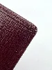 porte-cartes cartier must en cuir bordeaux avec finition dorée