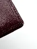 porte-cartes cartier must en cuir bordeaux avec finition dorée
