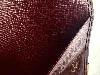 porte-cartes cartier must en cuir bordeaux avec finition dorée