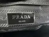 porte-documents prada en cuir noir saffiano sans bandoulière