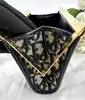 porte-monnaie/pochette vintage christian dior en toile jacquard beige et cuir bleu marine