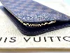 portefeuille long / organiser louis vuitton insolite en toile damier ébène
