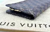 portefeuille long / organiser louis vuitton insolite en toile damier ébène