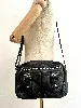 sac longchamp en cuir noir et détails argentés