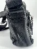 sac longchamp en cuir noir et détails argentés