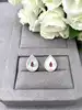 132035 boucle d'oreille nacre en forme goutte d'eau avec oxyde rouge et strass argent 925 millième (22 ct) 3,85g