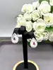 132035 boucle d'oreille nacre en forme goutte d'eau avec oxyde rouge et strass argent 925 millième (22 ct) 3,85g