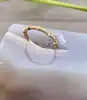 31510 bague anneau sertie d'oxydes