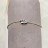 97393418 bracelet plaqué or 4 pierres verte bleue et roses l18 cm