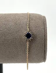 97397018 bracelet centré d'une pierre bleue et entournée des oxydes l18 cm