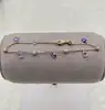97404118 bracelet orné d'oxydes violets l 18 cm