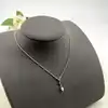 97427445 collier avec pendentif serpent avec perle synthétique l45 cm