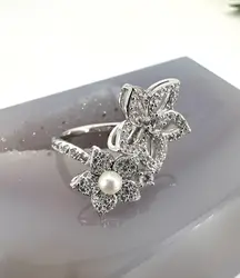 bague apm monaco fleurs et perle, pavée de zirconiums  t52 argent 925 millième (22 ct) 3,53g