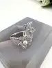 bague apm monaco fleurs et perle, pavée de zirconiums  t52 argent 925 millième (22 ct) 3,53g
