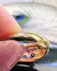 bague bombée sertie d'1 rubis, 5 saphirs, 2 petits diamants et 2 pierres de couleur or 750 millième (18 ct) 9,38g