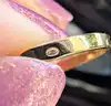 bague cocktail motifs végétaux ornée d'une perle de culture et 3 rubis syntéthiques or 750 millième (18 ct) 3,59g