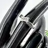 bague en argent ornée d'oxydes noires et blanches t57 argent 925 millième (22 ct) 2,07g