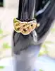 bague maille chaîne dont le maillon central mobile or 750 millième (18 ct) 13,41g