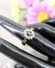 bague marguerite en or centrée d'un saphir entouré de 12 diamants or 750 millième (18 ct) 4,19g