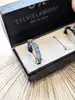 bague sylvie lambert modulable avec 3 anneaux de couleur en résine or 750 millième (18 ct) 1,49g