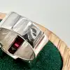 bague tank vintage sertie des rubis synthétiques et quartz blancs épaulés deux feuille d'or en or rose de 18k argent 800 millième 