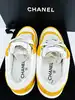 baskets chanel en cuir de chèvre velours jaune et blanc