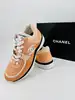 baskets chanel en tisssu et cuir de veau velours orange clair