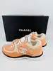 baskets chanel en tisssu et cuir de veau velours orange clair