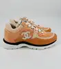 baskets chanel en tisssu et cuir de veau velours orange clair