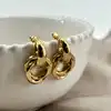 boac boucles d'oreilles en acier anneaux entrelacés