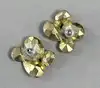 boucle d'oreille clip trifari avec pierres de couleurs
