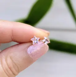boucle d'oreilles puces chacune sertie d'une pierre rose en forme d'étoile or 750 millième (18 ct) 0,29g