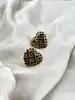boucles d'oreilles clip vintage en métal doré