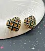 boucles d'oreilles clip vintage en métal doré